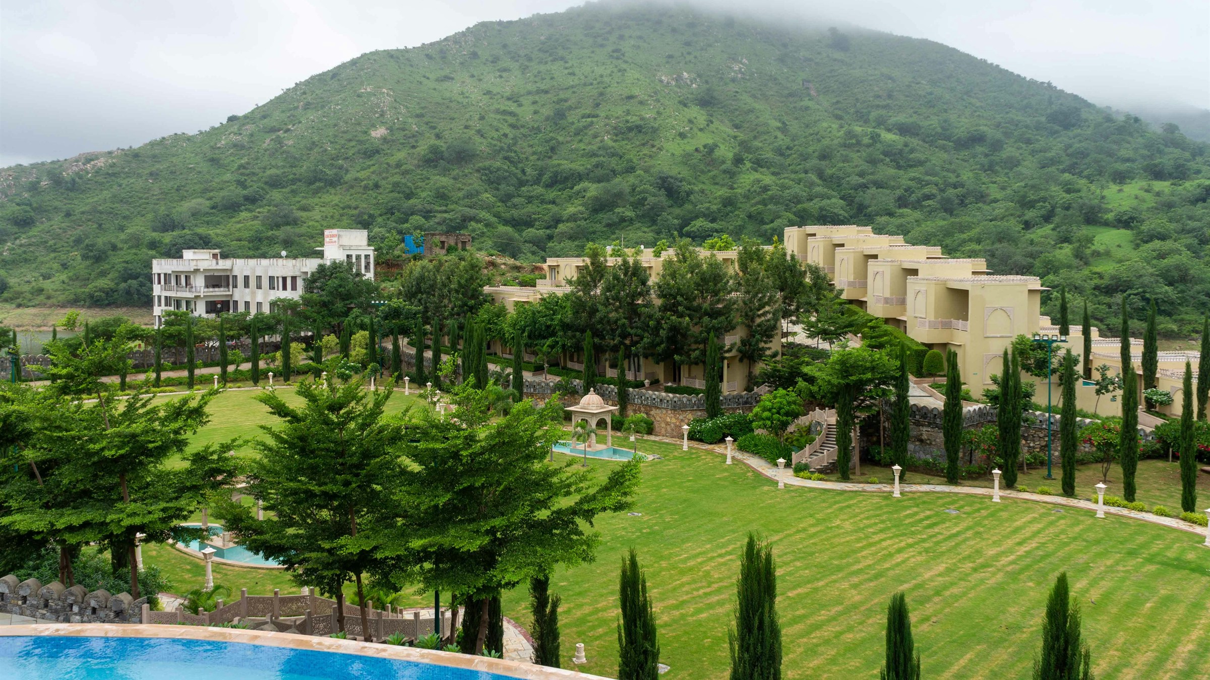 Misty hillside resort gardens